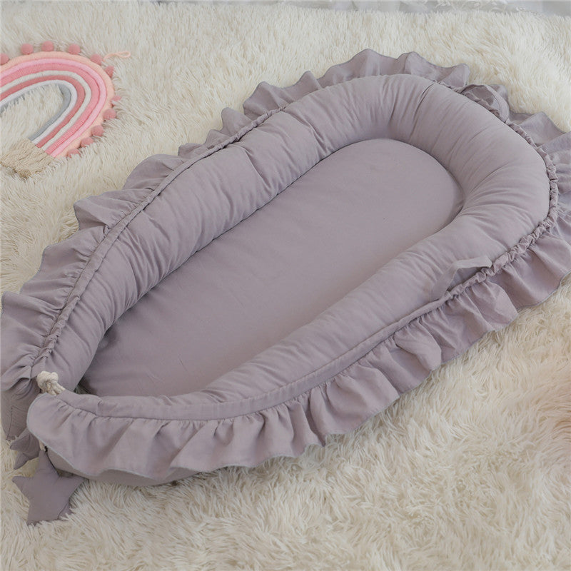 Baby Kuschelnest mit Rüschen
